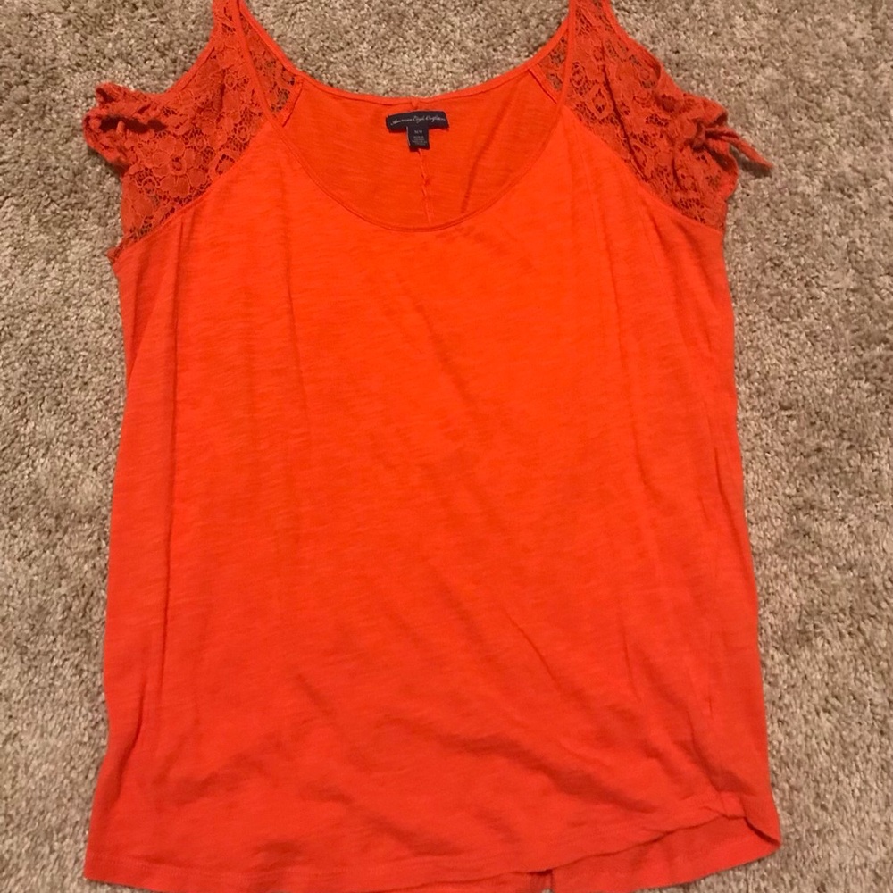 White and orange tops